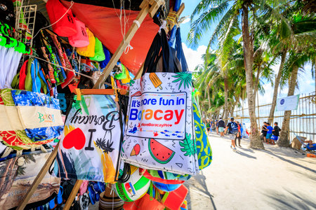 Local souvenir shops - lined white beach on Nov 19, 2017 in Boracay Island, Philippines