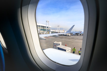 Philippine Airlines (PAL) at NAIA International Airport Terminal 2 view from window plane on Nov 17,...