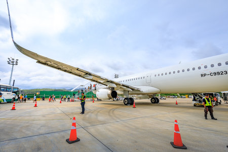 Unknown tourists leaving a airplane of Philippine Airlines (PAL) at Boracay Airport on Nov 17, 2017 in Caticlan, Philippines.のeditorial素材