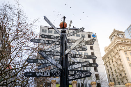 Portland, United States - Dec 19, 2017 : Famous signpost with directions to world landmarks at Pioneer Courthouse Squareのeditorial素材