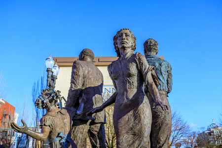 Portland, Oregon, United States - Dec 20, 2017 : The Dream (bronze statue) in front of Oregon Convention Center, that is located on the east side of the Willamette River in the Lloyd District neighborhood.のeditorial素材