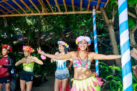 BORACAY ISLAND, PHILIPPINES - November 19, 2017 : Happy filipino portrait dancing at Crystal Cove in Boracay Islandのeditorial素材