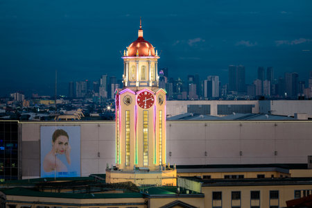 Manila, Philippines - Feb 4, 2018 : The clock tower of the Manila City Hall at night view from Intamurose district, Manilaのeditorial素材