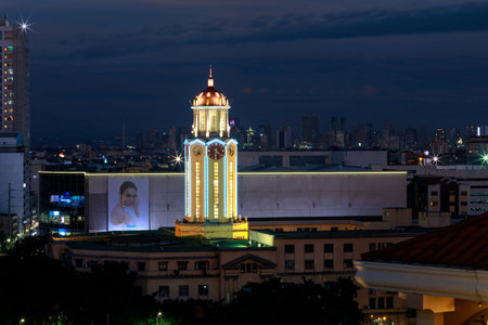 Manila, Philippines - Feb 4, 2018 : The clock tower of the Manila City Hall at night view from Intamurose district, Manilaのeditorial素材