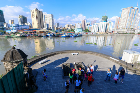 Manila, Philippines - Feb 17, 2018 : Tourist waching Manila pasig river view from Fort Santiago view deck, Intramuros, Manila, Philippinesのeditorial素材