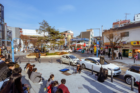 Seoul, South Korea - March 3, 2018 : Hongdae (Hongik University) shopping street. Hongdae is a shopping cultural street for young people in Seoul.のeditorial素材