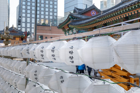 Paper lanterns hanging at Jogyesa Buddhist temple, Seoul, South Korea. Letter on lanterns means 'Buddhist heaven'のeditorial素材