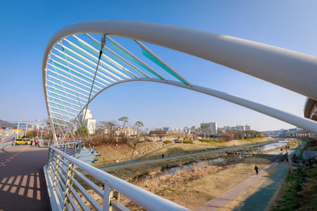 Gimhae, South Korea - March 10, 2018 : The scenery of modern bridge over Gimhae stream parkのeditorial素材