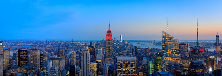 New York City. Manhattan downtown skyline with illuminated Empire State Building and skyscrapers at sunsetのeditorial素材
