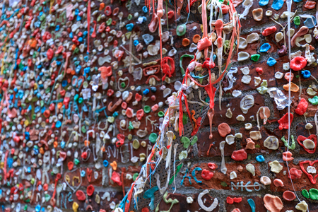 Gum wall Seattle, which is a local landmark in downtown Seattle, in Post Alley under Pike Place Market.のeditorial素材