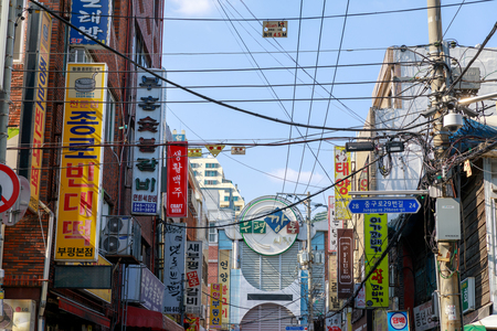 Busan, South Korea - Aug 5, 2018 : View of Bupyeong Kkangtong Market with various restaurant signages in Busan cityのeditorial素材