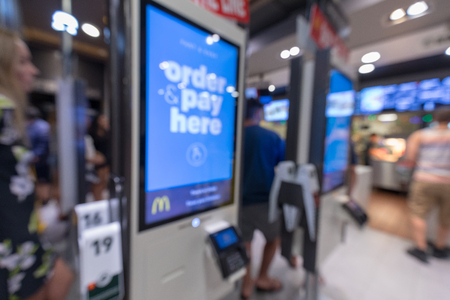 Honolulu, Hawaii - Dec 22, 2018 : blurred background - Self-ordering and self payment kiosk for fast food chainsのeditorial素材