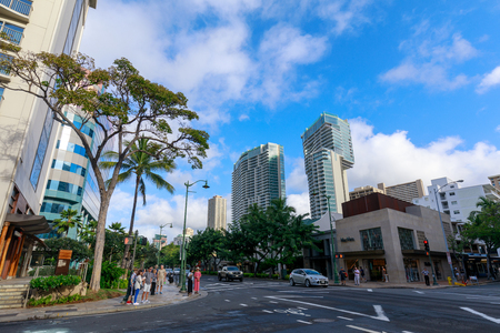Honolulu, Hawaii - Dec 25, 2018 : Kalakaua Avenue lined with palm coconut trees in Honoluluのeditorial素材