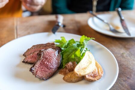 Barbecue Wagyu Point Steak with coulotte, arugula, potato, shallot vinaigretteの写真素材