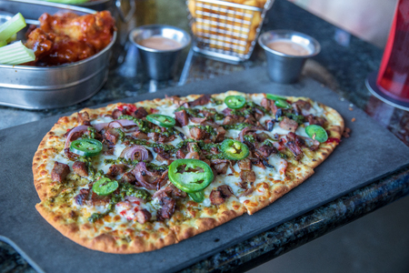 Hillsboro, Oregon - May 11, 2019 : Delicious food at TopGolf in Oregon, Entertainment venue with swanky lounge with drinks & gamesのeditorial素材
