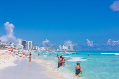 Cancun, Mexico - Aug 30, 2019 : View of Cancun beach in Caribbean Sea. Exotic Paradise. Travel, Tourism and Vacations Concept
