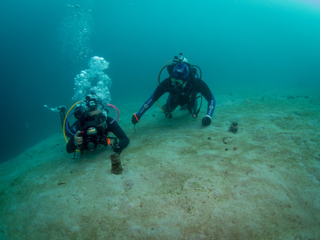 Anilao, Philippines - Jul 22, 2017 : Scuba diver doing underwater photography in Anilao Philippinesのeditorial素材