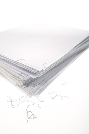 A sheaf of paper stacked randomly.