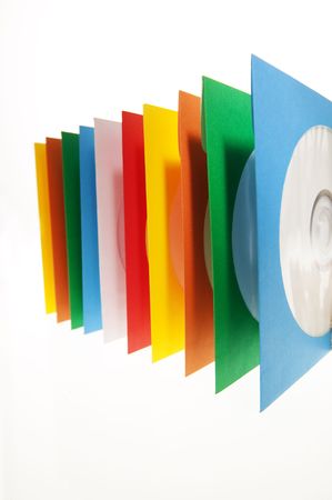 Multiple disc sleeves, standing on a clean background with a disc showing in the first window.の写真素材