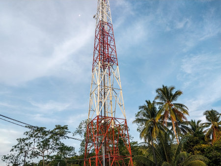 Telecommunication tower with blue sky and cloud in the morning, Biak, Papua, Indonesia