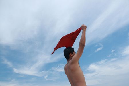 A man on the beach in thailand at daylightの写真素材