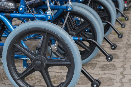 closed-up of blue wheelchair in hospitalの写真素材