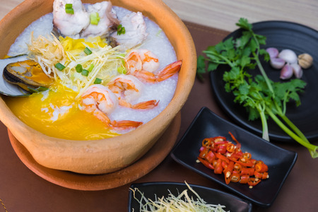 seafood asian thai rice soup in Pottery