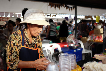 Bangkok, Thailand - July 5, 2015 : Bangkok shopping event, Art Box. The women is selling the drinks.のeditorial素材