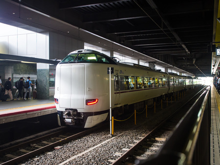 Osaka, Japan - Jun 4, 2016 : White Japanese bullet high speed train, Shinkansen. It used to be the world fastest and highest train technology. Very nice, seeing it at the station.のeditorial素材