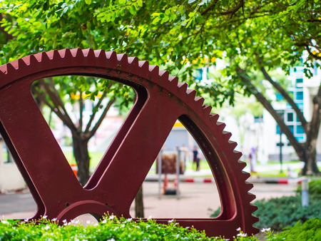 The red gear, the symbolic of engineering faculty in every university of Thailand. Every machines require gear, an mechanical engineering is one of the popular engineering among the world.の写真素材