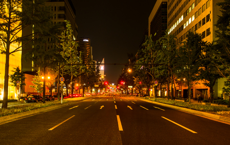 Osaka, Japan - Jun 6, 2016 : A clear street road during night in Osaka. Such a peaceful moment where there is no car traveling as a daytime.のeditorial素材