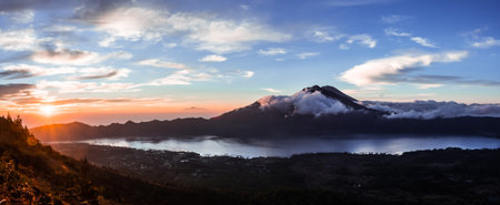 The sunrise view from submit opposited to Batur Mountain, one of the volcanoes in Bali, Indonesia.の写真素材