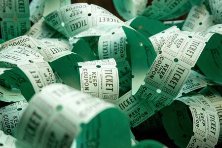 Unrolled roll of green admit one raffle ticketsの写真素材