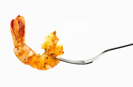 cooked unshelled tiger shrimps isolated on whiteの写真素材