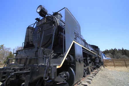 steam locomotive against blue sky