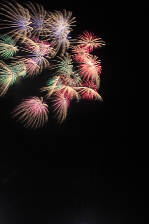 Japanese traditional fireworks against a black sky の写真素材