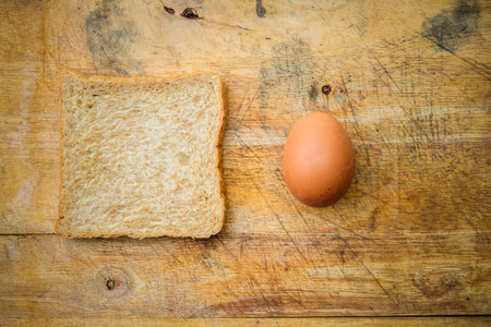 a piece of bread and eggの写真素材