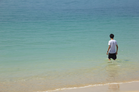 alone guy and seaの写真素材