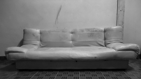 Old sofa with empty room black and white tone.の写真素材