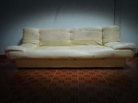 Old sofa with empty room and no one.の写真素材