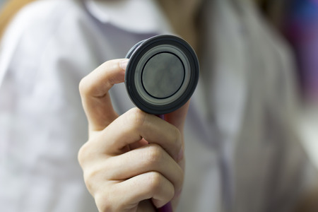 The doctor is examining the patient.の写真素材