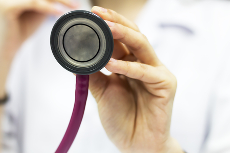 The doctor is examining the patient.の写真素材