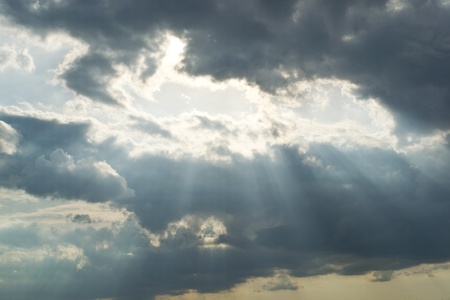 Sun rays and clouds