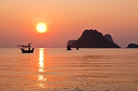 Beautiful sunrise on the beach at prachuapkhirikhan in Thailand の写真素材