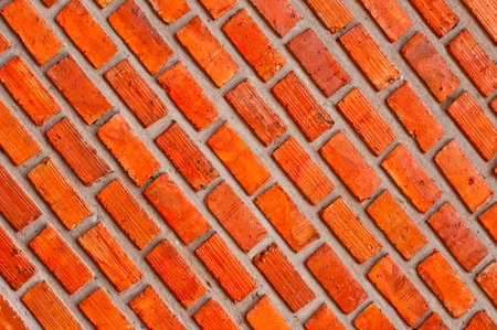 Red brick wall texture in inclined view の写真素材