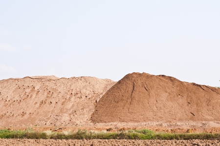 Sand pile for sale with blue sky, Thailandの写真素材