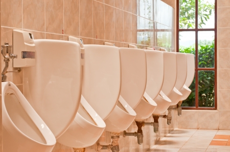 urinal man clean toilets の写真素材