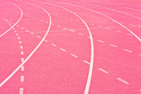 Lanes of a race track with a curve at the endの写真素材