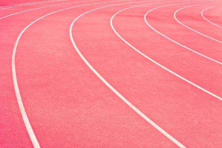 Lanes of a race track with a curve at the endの写真素材