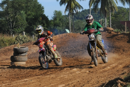 CHIANGKHAN, THAILAND - OCTOBER 28: Unidentified riders participate in competition Supercross Championship of Thailand, on October 28, 2012 in Chiangkhan,Loei,Thailand のeditorial素材
